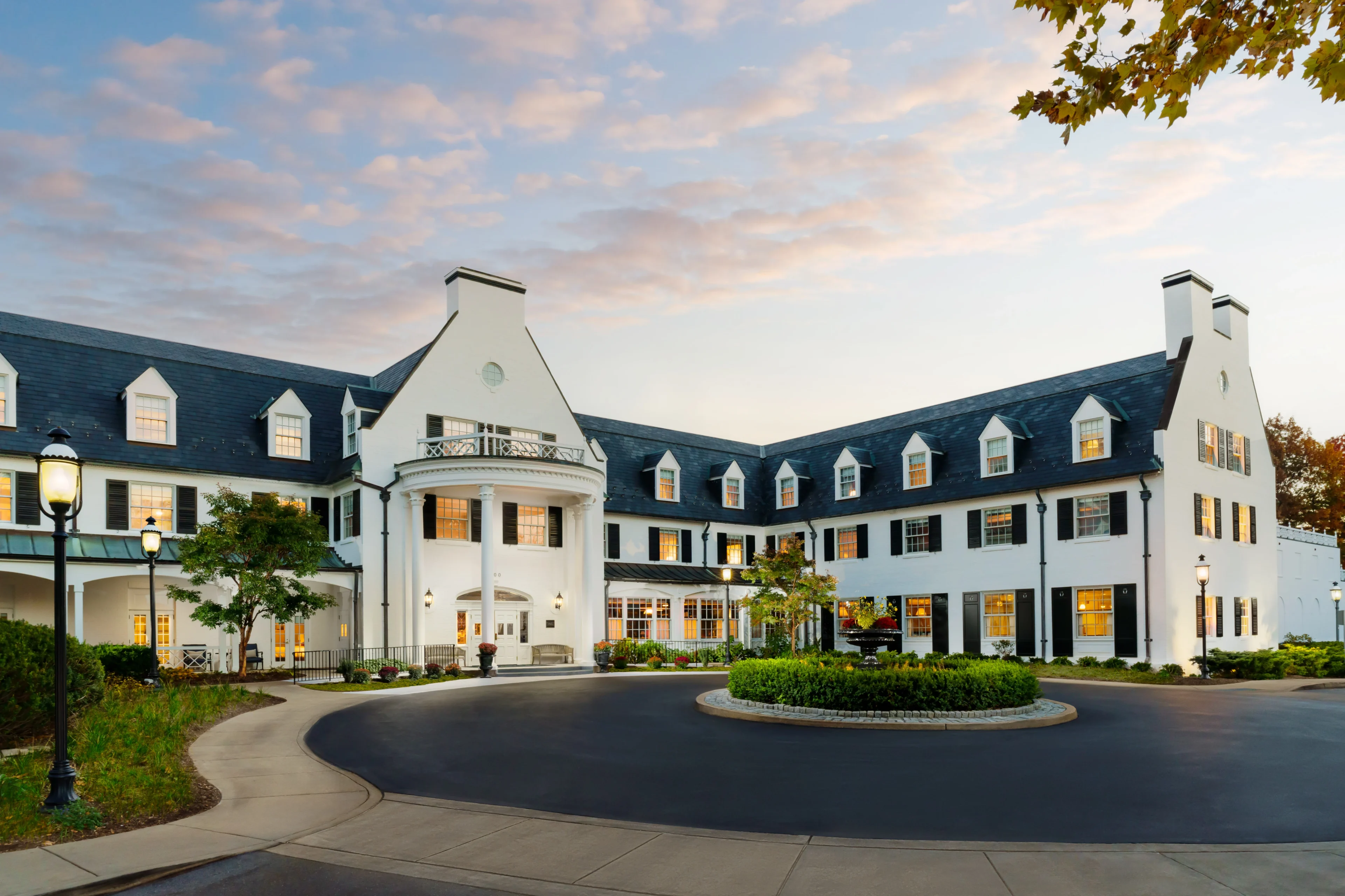 Elegant hotel building at sunset.