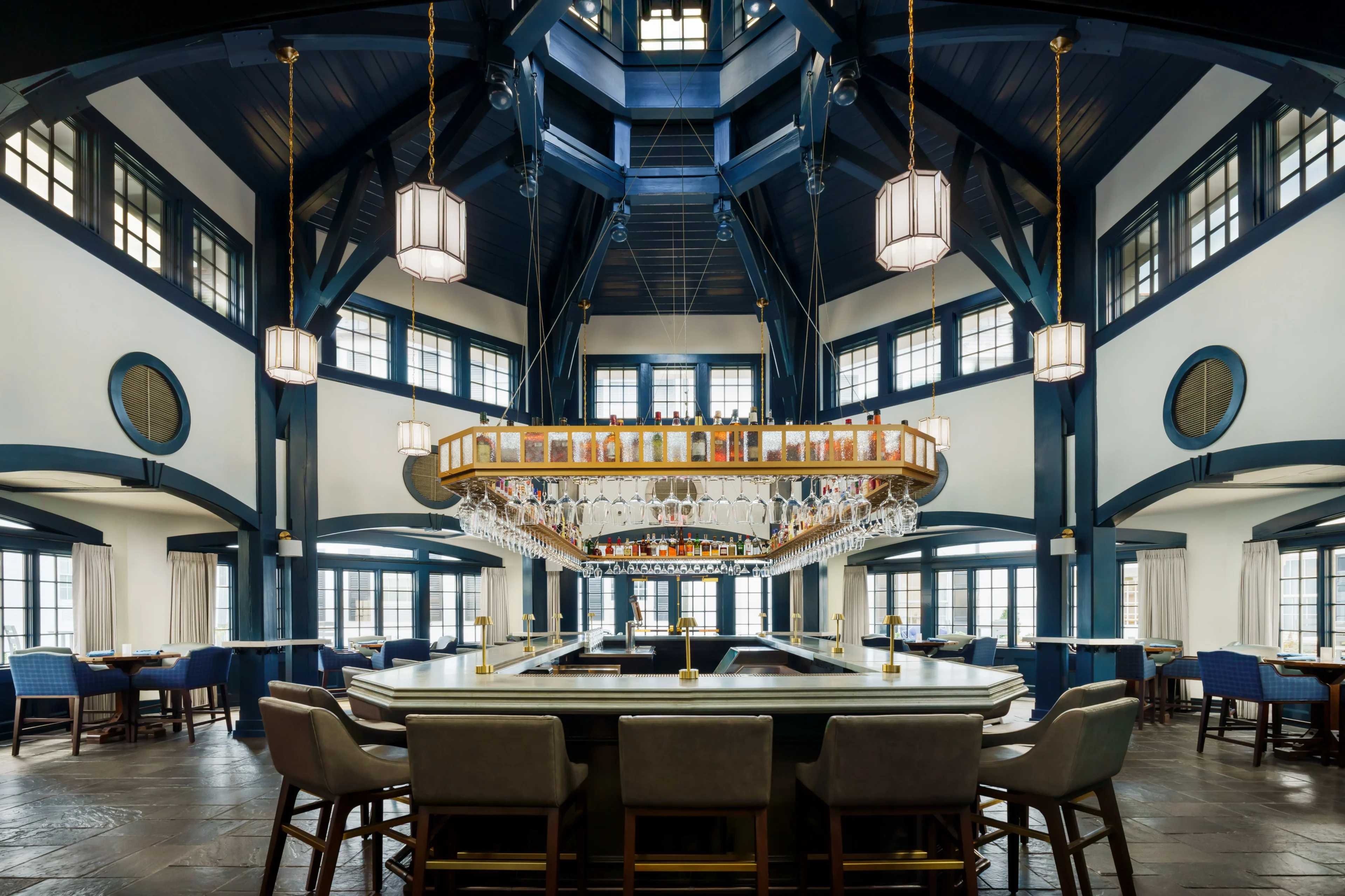 Elegant restaurant interior with central bar area.