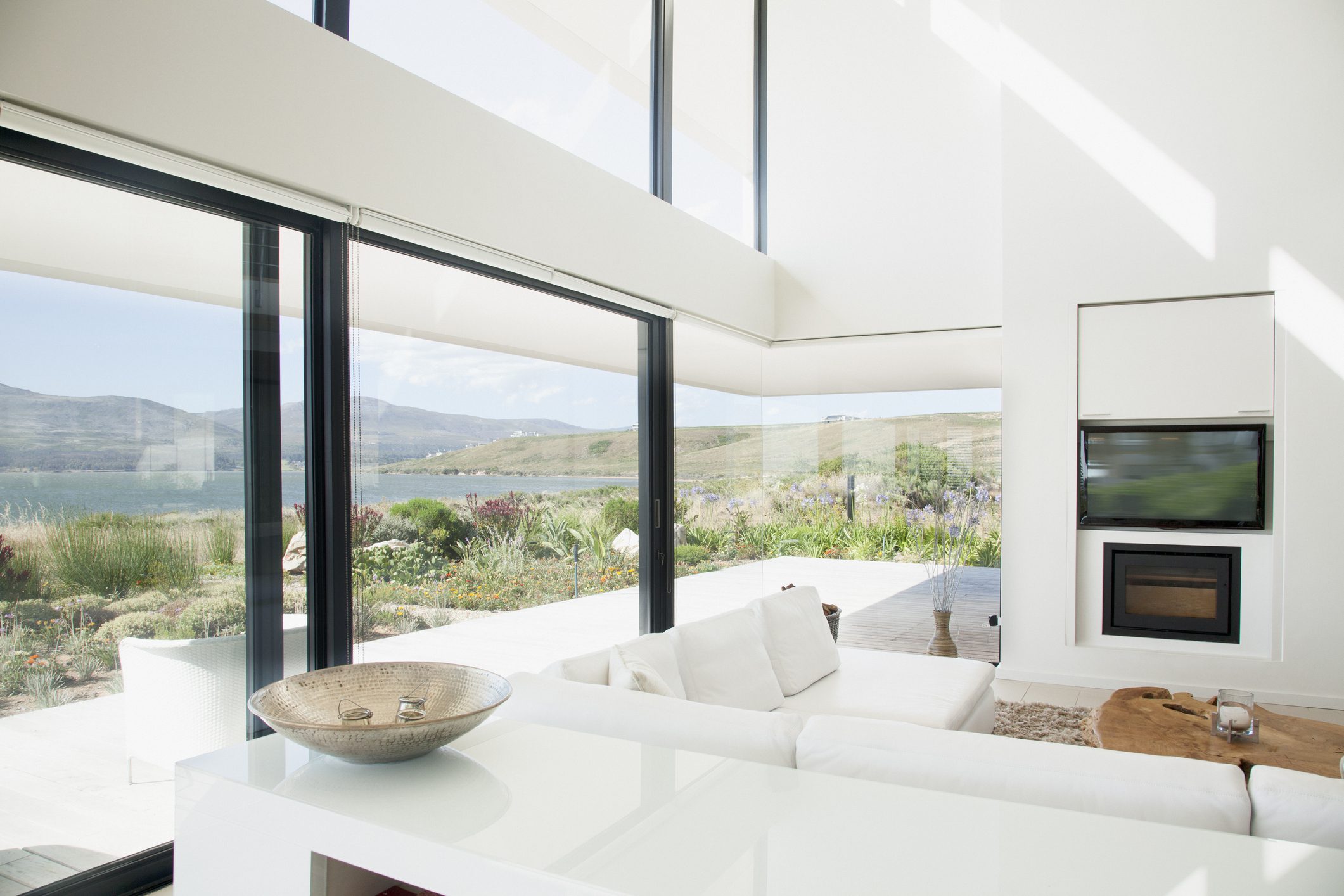 Modern living room with large windows view.
